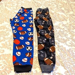 Boys fleece pajama pants with sports theme